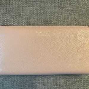 Blush pink pebbled leather Kate Spade wallet